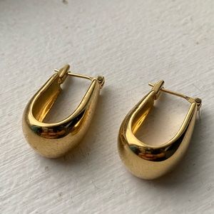 Gold swoop earrings
